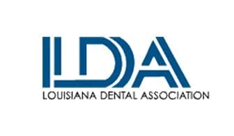 A logo of louisiana dental association